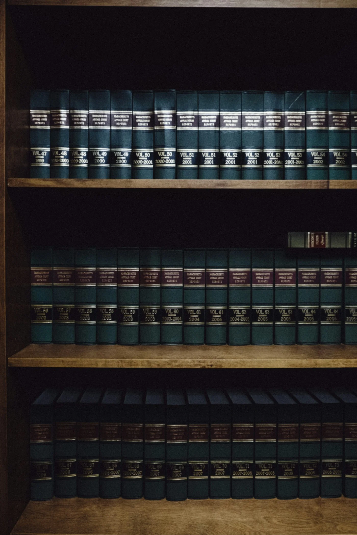Law books in a Boston library. Legal context photograph, unrelated to the Spanish court proceedings.