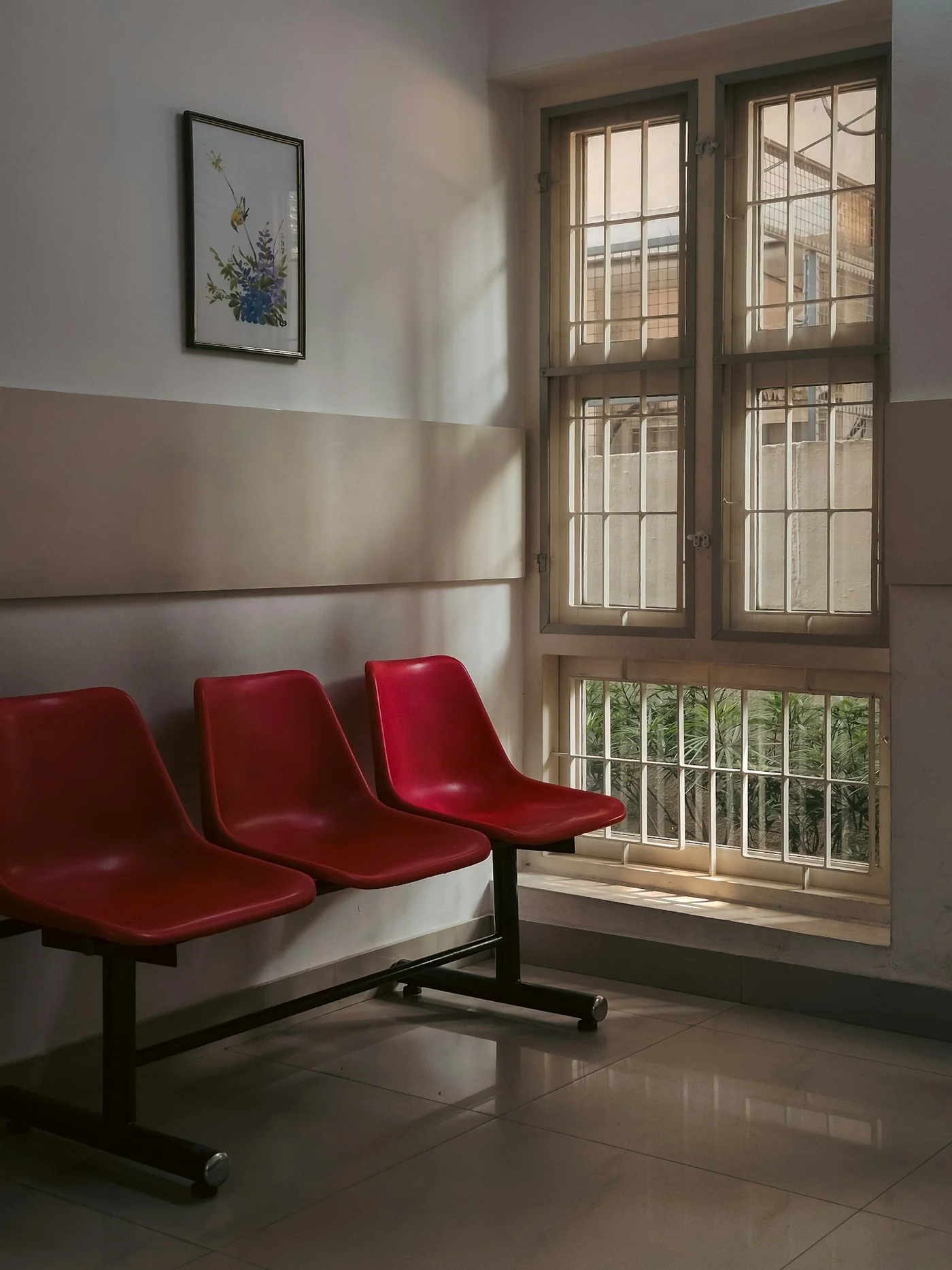 An empty waiting room. Context for access to care; this photograph is not from the study and depicts none of its participants.