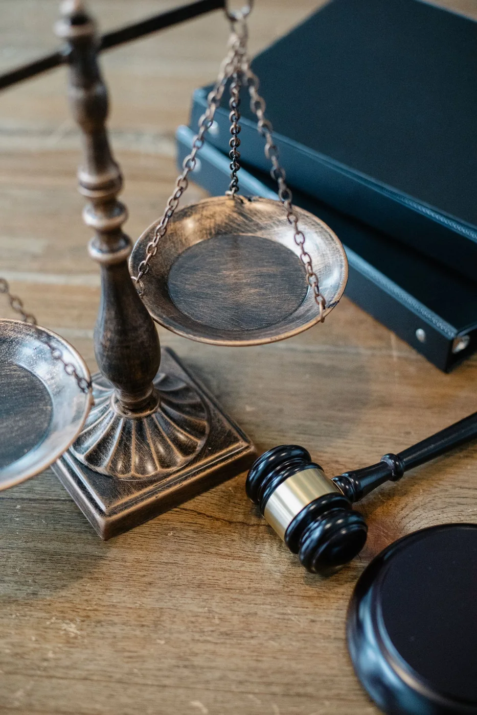 Decorative scales and gavel on a table. Legal stock photograph, not the court or evidence from the case.