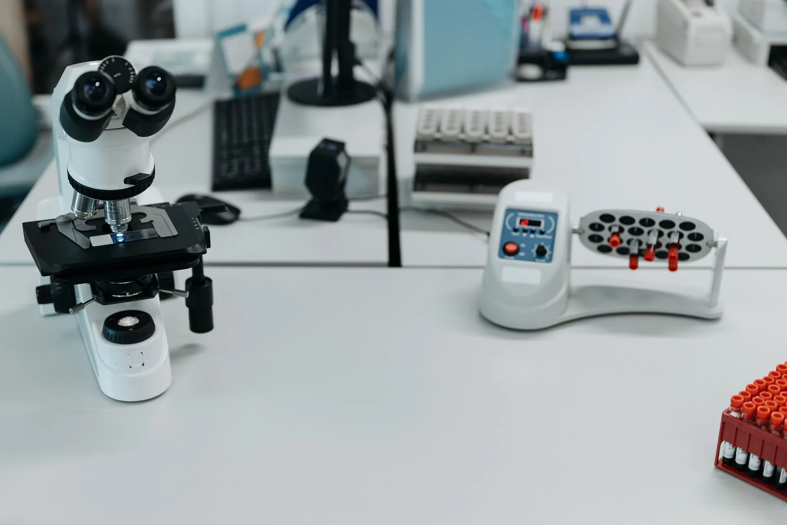 Microscope and laboratory equipment. Stock photograph of clinical analysis, not a sample or a particular spiking case.