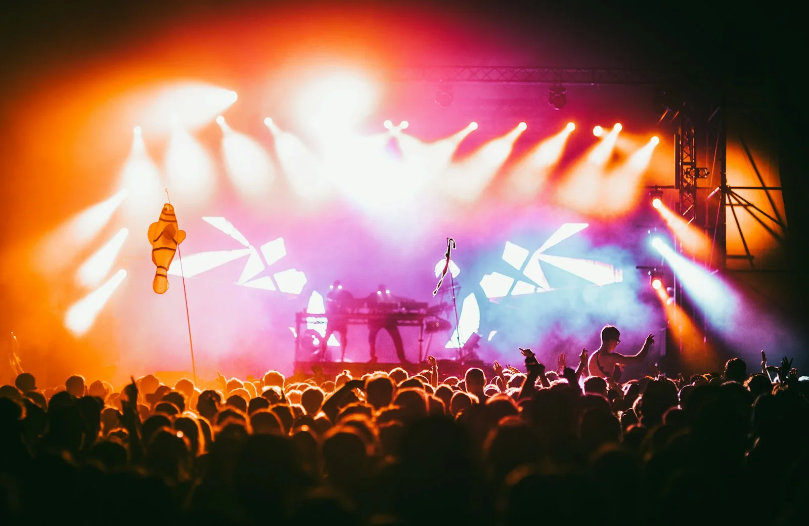 Audience at Latitude Festival, UK, in a 2024 archive photograph. Festive nightlife context; it does not depict Boston or a spiking incident.